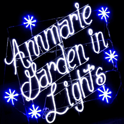 Annmare Garden In Lights Display at Night, "Annmarie Garden in Lights" written with white string lights