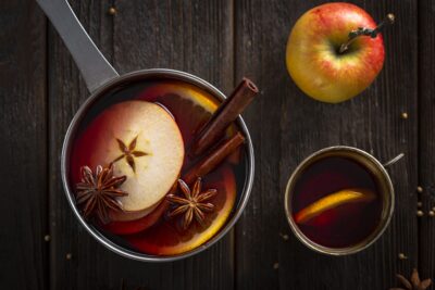 Flat Lay Pan With Mulled Wine Cup and Apple